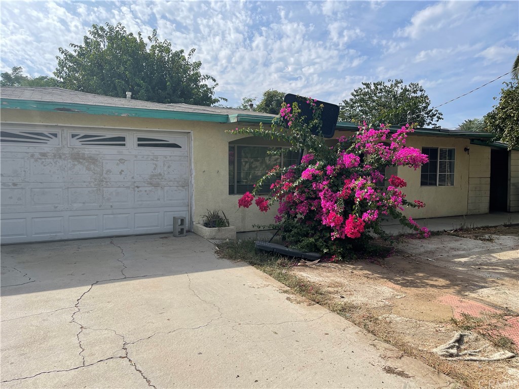 5520 Mitchell Avenue Riverside, CA 92505 - Photo 1 of 1 a front view of a house with a garage
