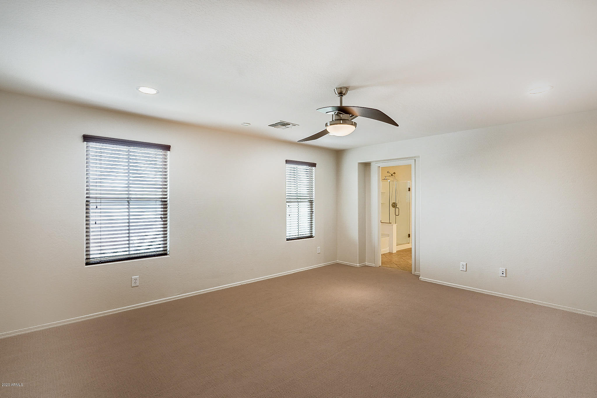 3322 East Roland Street Mesa, AZ 85213 - Photo 25 of 37 Master bedroom