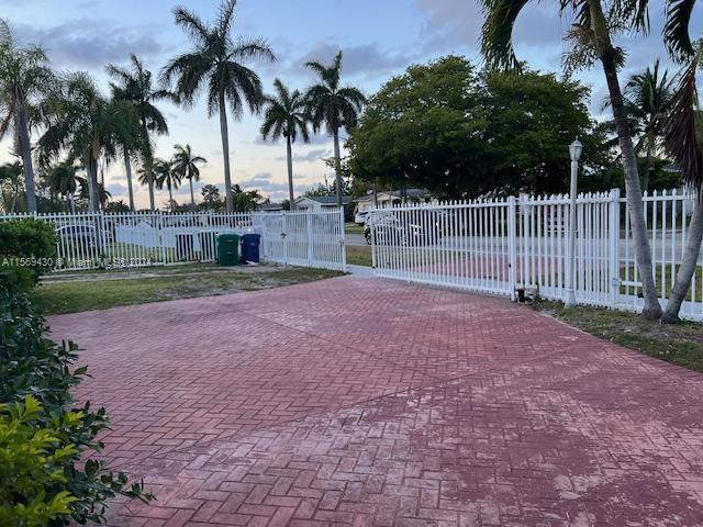 19260 Franjo Road Cutler Bay, FL 33157 - Photo 1 of 18 a view of a backyard with palm trees