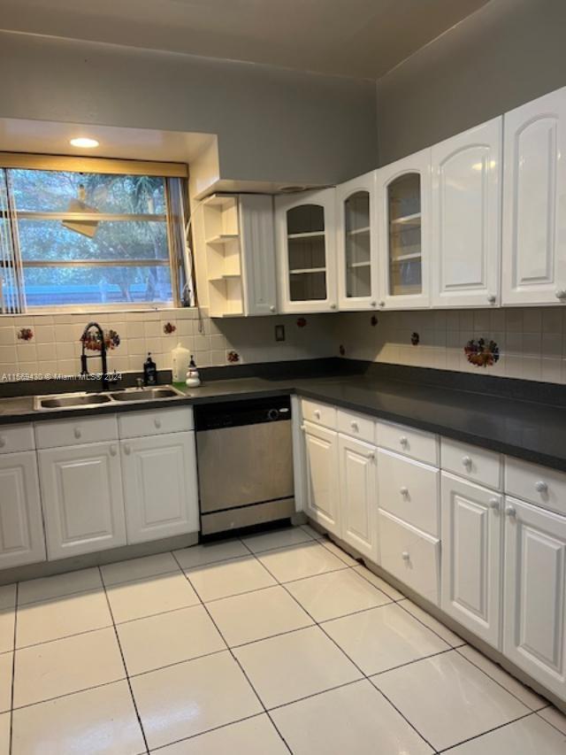 19260 Franjo Road Cutler Bay, FL 33157 - Photo 11 of 18 a kitchen with a sink and cabinets