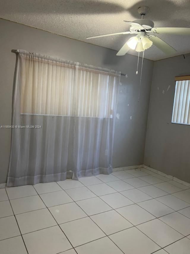 19260 Franjo Road Cutler Bay, FL 33157 - Photo 14 of 18 a view of entryway with a chandelier fan