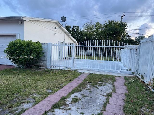 19260 Franjo Road Cutler Bay, FL 33157 - Photo 18 of 18 a view of a pathway with a garden