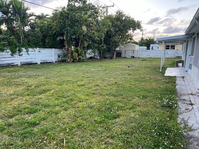 19260 Franjo Road Cutler Bay, FL 33157 - Photo 6 of 18 a view of a house with backyard and sitting area