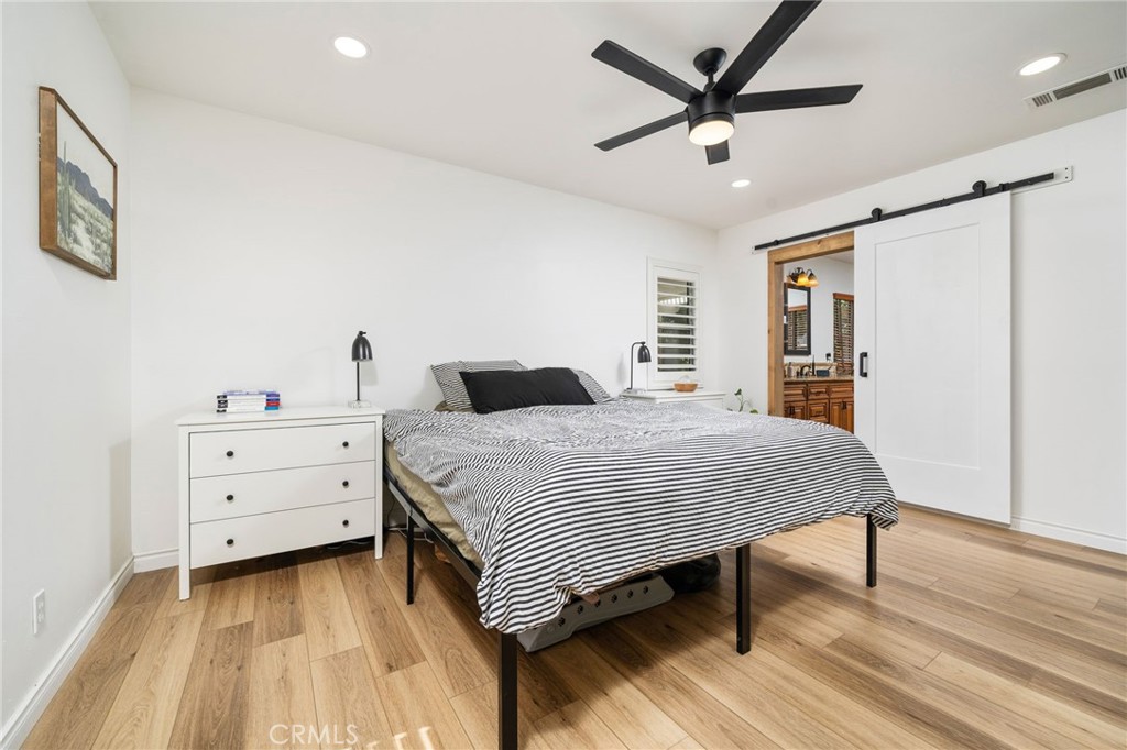 1995 Rincon Avenue Riverside, CA 92506 - Photo 13 of 18 a bedroom with a bed and a dresser