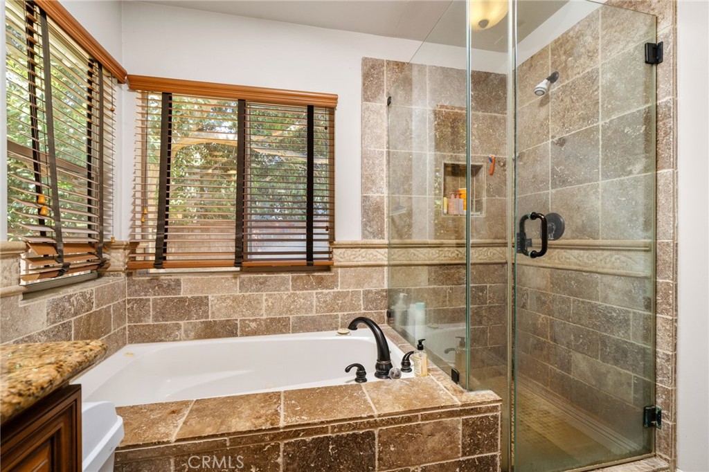 1995 Rincon Avenue Riverside, CA 92506 - Photo 16 of 18 a bathroom with shower and a bathtub