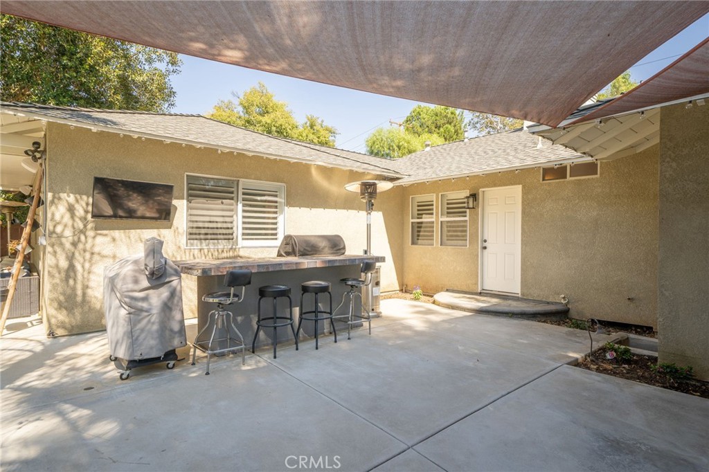 1995 Rincon Avenue Riverside, CA 92506 - Photo 17 of 18 a backyard of a house with table and chairs