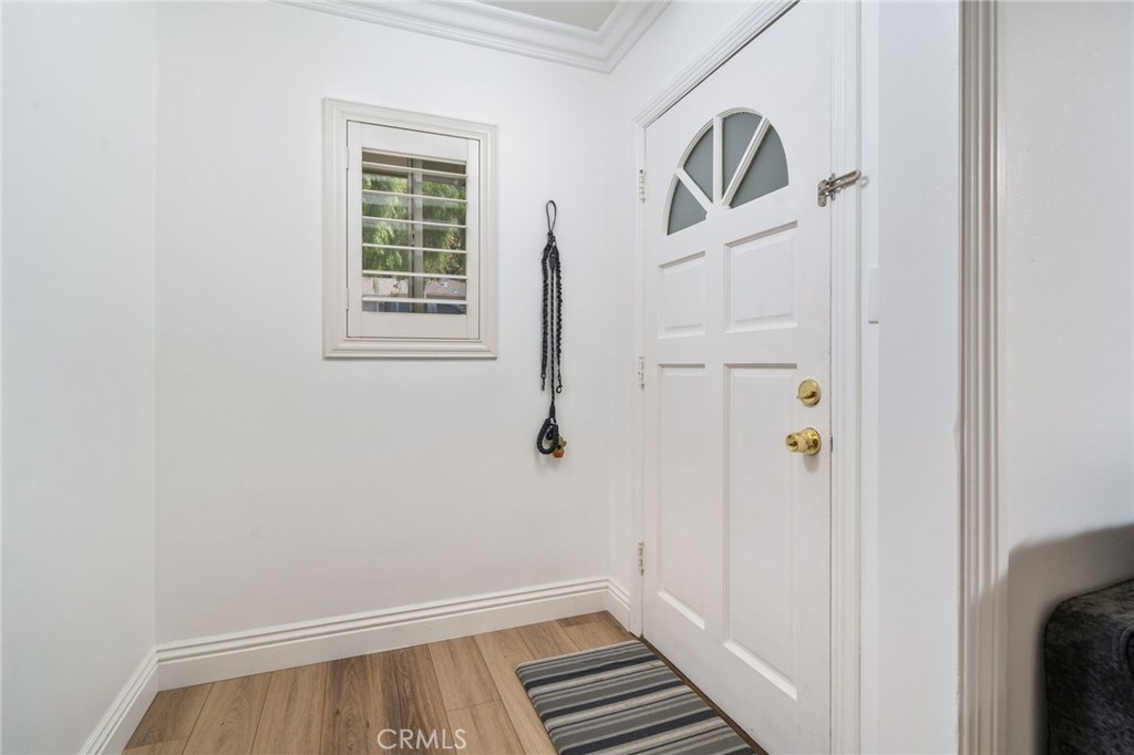 1995 Rincon Avenue Riverside, CA 92506 - Photo 4 of 18 a view of an entryway with wooden floor