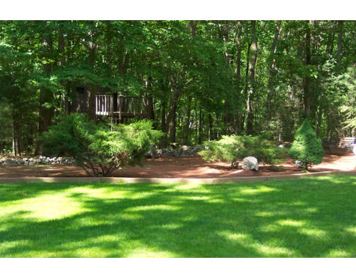 20 Rowley Road Boxford, MA 01921 - Photo 21 of 21 a backyard of a house with table and chairs