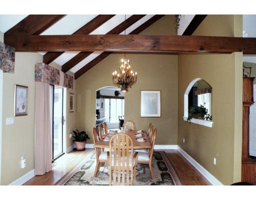 20 Rowley Road Boxford, MA 01921 - Photo 8 of 21 a view of livingroom with dining room and wooden floor