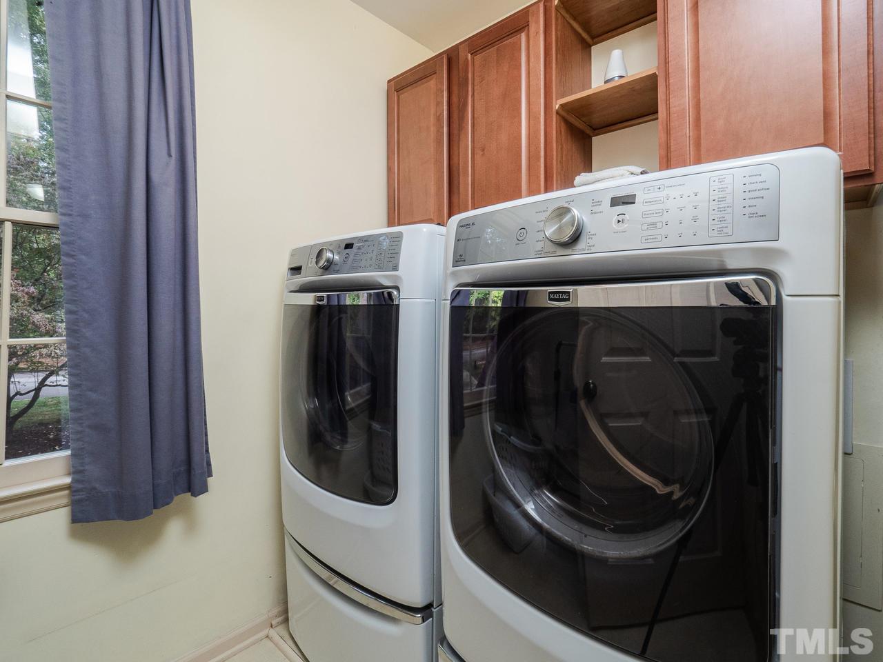 7705 Valley Run Drive Raleigh, NC 27615 - Photo 13 of 27 a utility room with dryer and washer