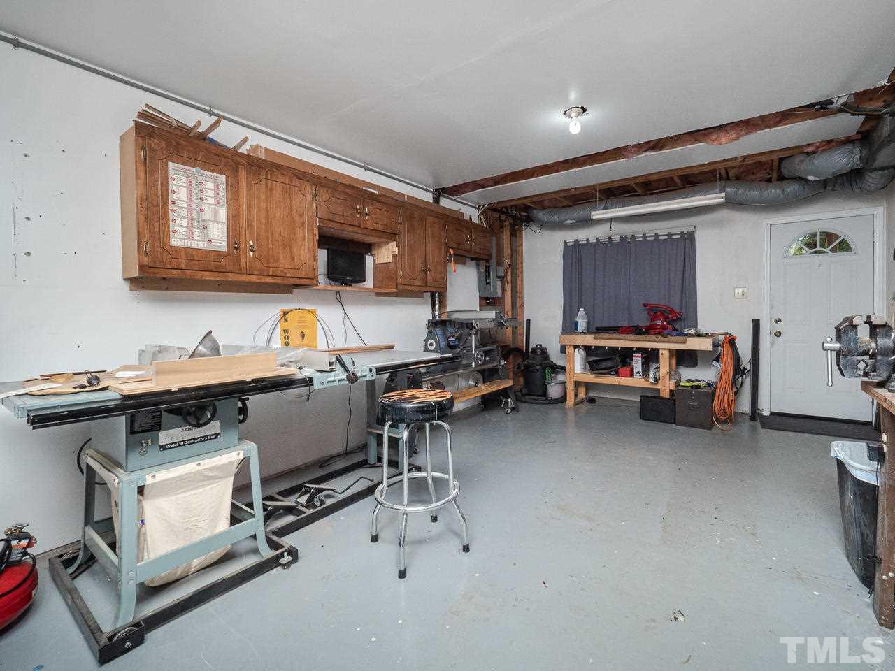7705 Valley Run Drive Raleigh, NC 27615 - Photo 20 of 27 a view of kitchen and car parked