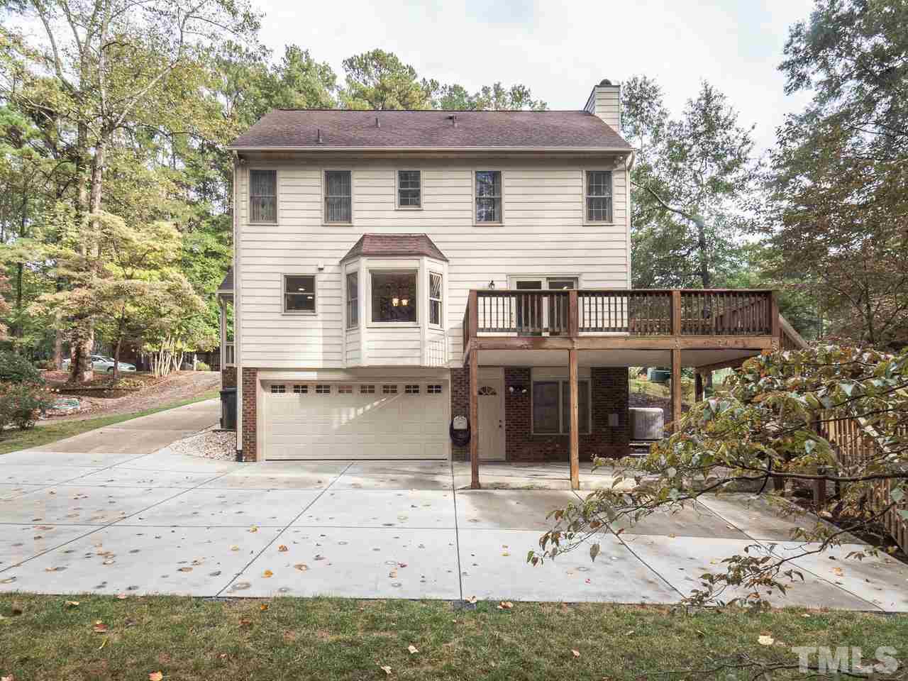 7705 Valley Run Drive Raleigh, NC 27615 - Photo 24 of 27 a front view of a house with a porch