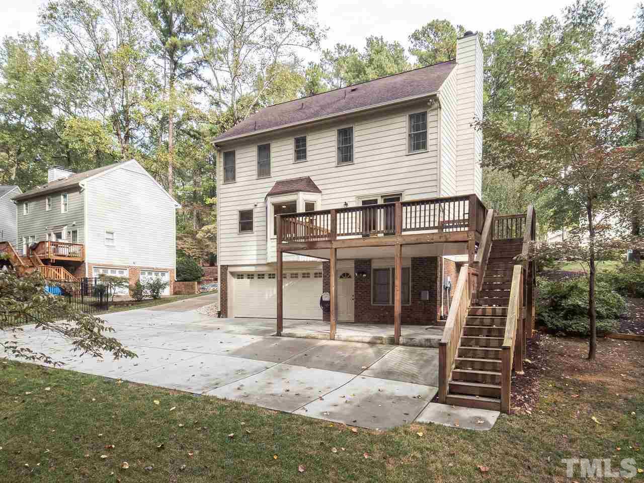 7705 Valley Run Drive Raleigh, NC 27615 - Photo 25 of 27 a view of a house with a yard