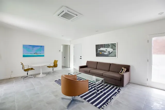 a living room with furniture and a couch