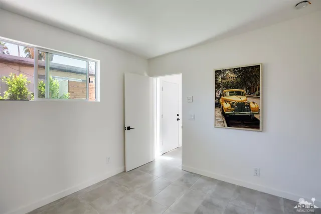 a view of a storage & utility room with washer and dryer