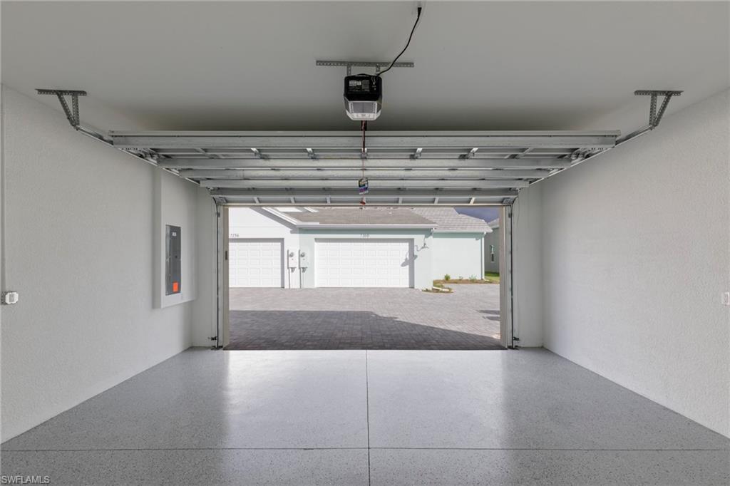 7184 Cayo Coco Lane Naples, FL 34113 - Photo 21 of 40 a view of a garage