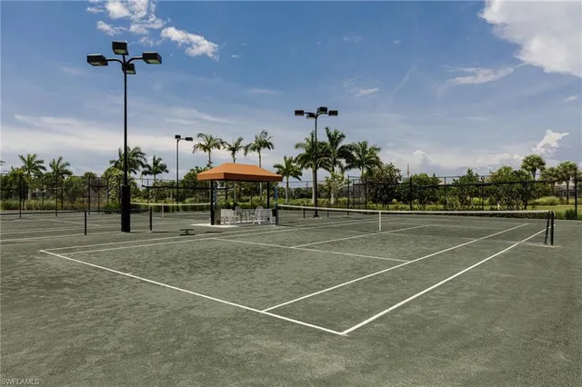 a view of an outdoor space and tennis court
