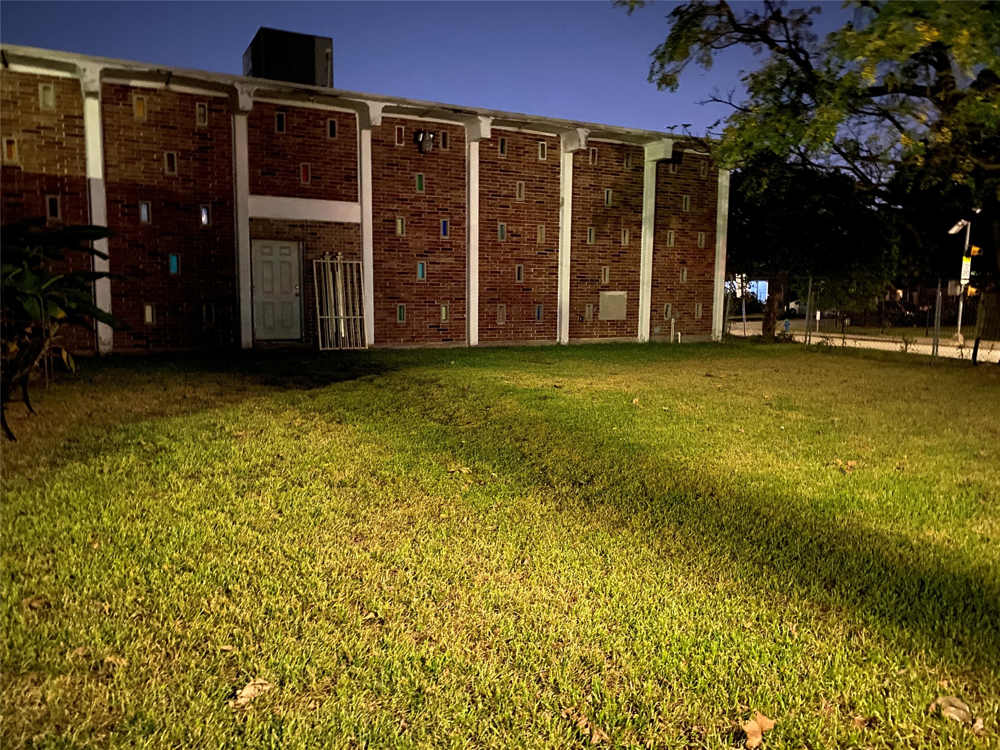 1102 75th Street Houston, TX 77012 - Photo 38 of 43 a view of a house with a yard
