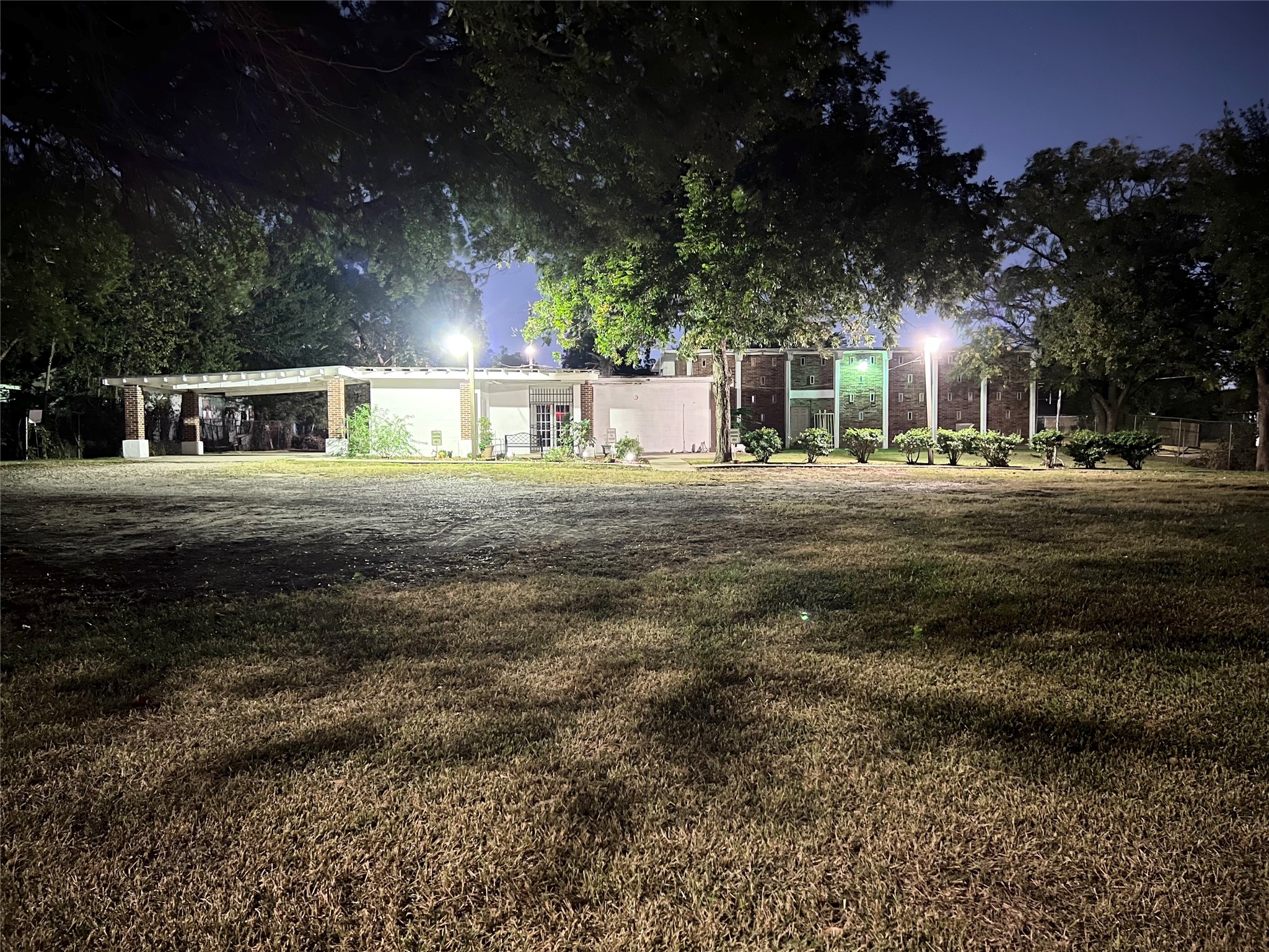 1102 75th Street Houston, TX 77012 - Photo 4 of 43 a front view of a house with a yard