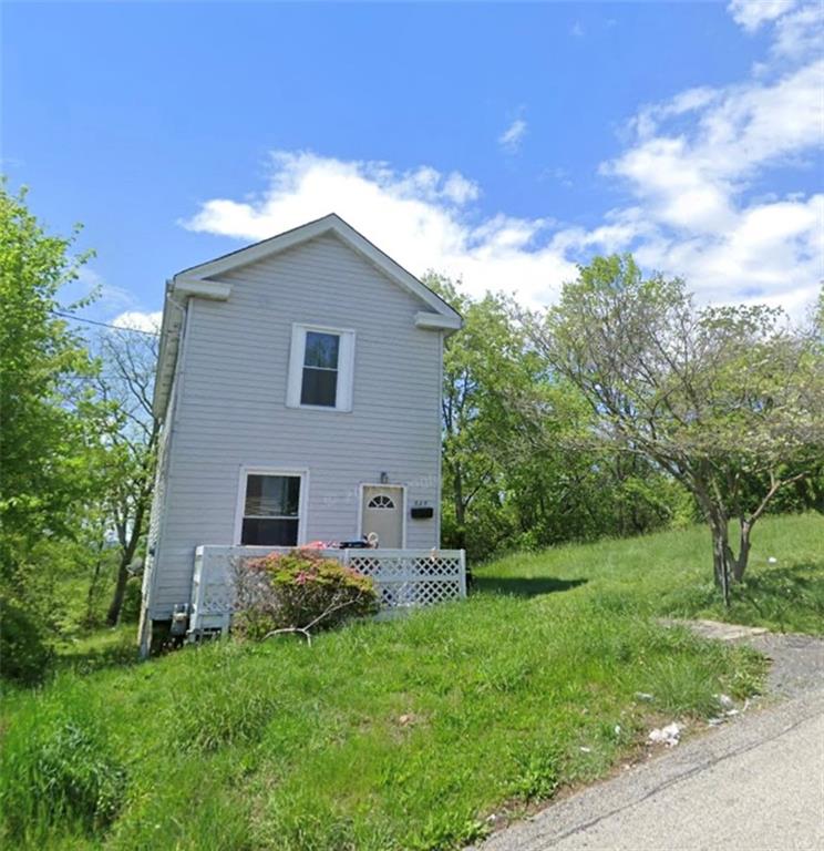 525 8th Street Clairton, PA 15025 - Photo 1 of 1 a house view with a garden space
