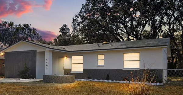 a view of a house with a swimming pool