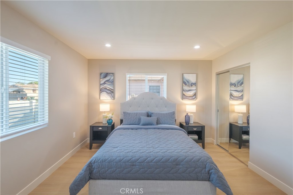 223 South Aprilia Avenue Compton, CA 90220 - Photo 14 of 46 a bed room with a bed and a window