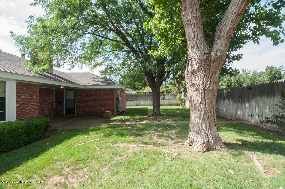 3306 Lombard Road Amarillo, TX 79106 - Photo 22 of 23 a house is sitting in middle od the grass