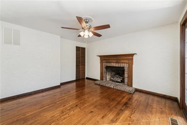 a view of livingroom with furniture and floor to ceiling window