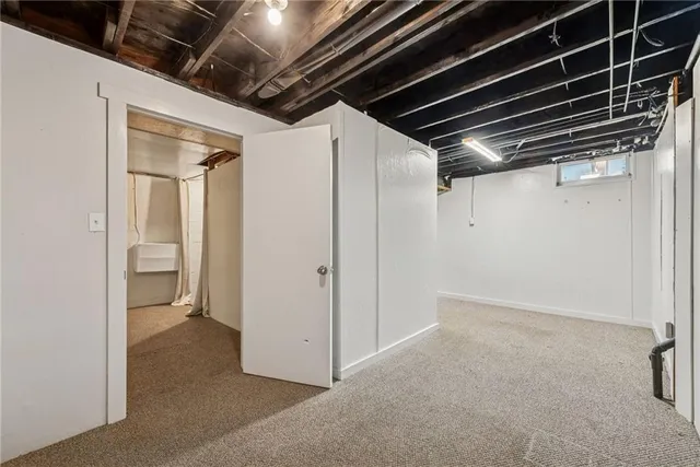 a bathroom with a tub and shower