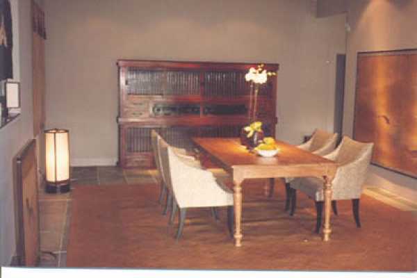 19-4023 Old Volcano Road Volcano, HI 96785 - Photo 9 of 17 a view of a dining room with furniture and wooden floor