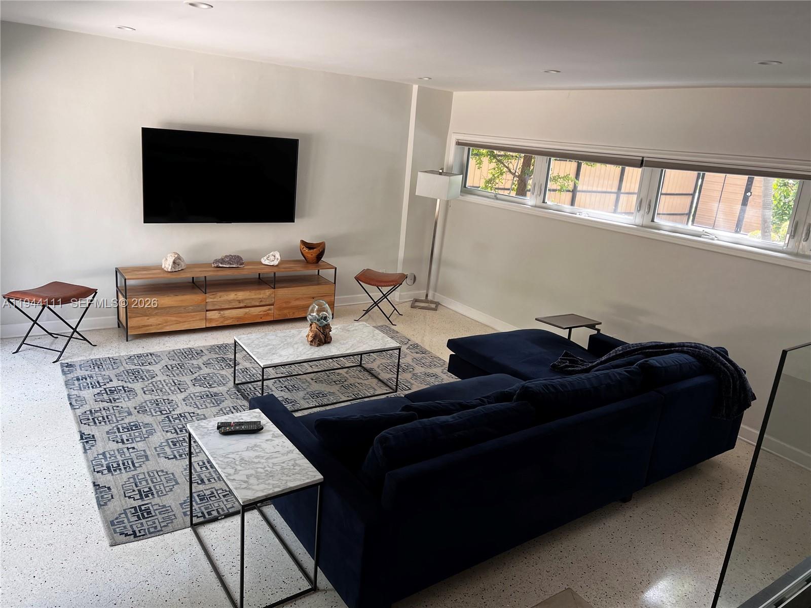2301 South Miami Avenue Miami, FL 33129 - Photo 42 of 68 a living room with furniture and a flat screen tv