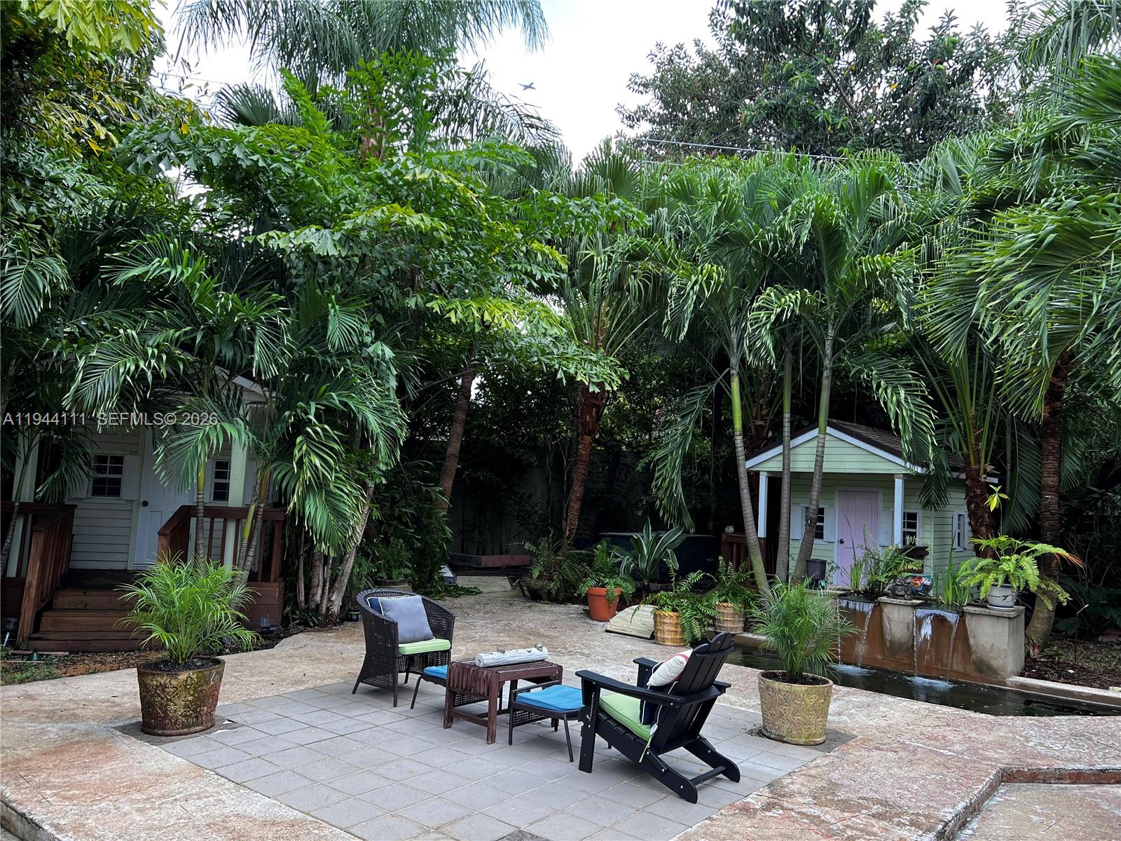 2301 South Miami Avenue Miami, FL 33129 - Photo 43 of 68 a view of a house with backyard sitting area and garden