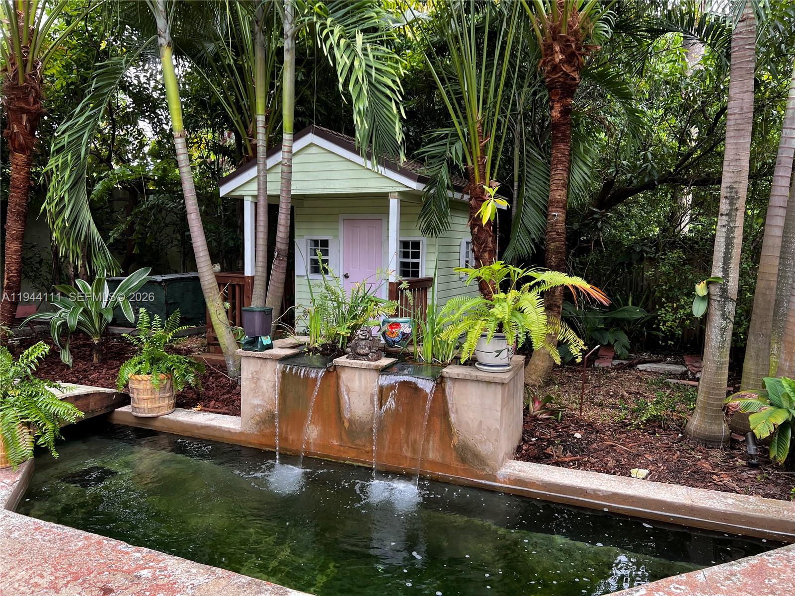 2301 South Miami Avenue Miami, FL 33129 - Photo 44 of 68 a front view of a house with a yard