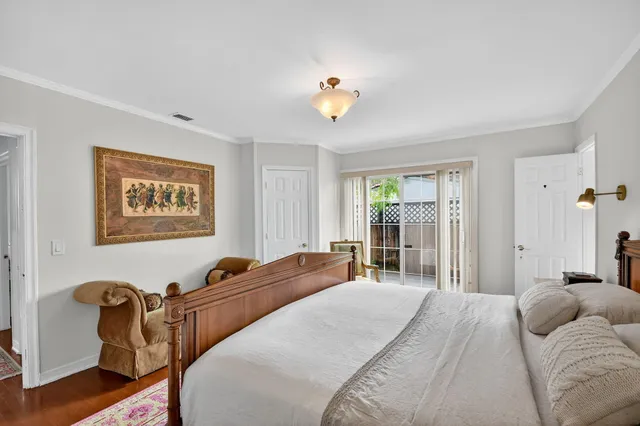 a bathroom with a sink a mirror a toilet and a shower