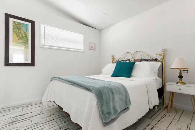 a kitchen with stainless steel appliances cabinets and a refrigerator