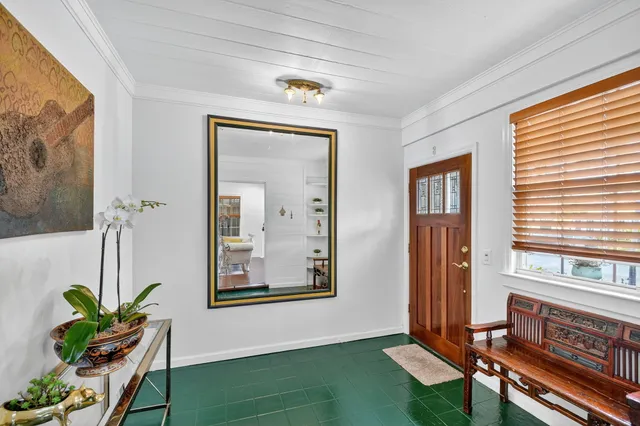 a living room with furniture fireplace and flat screen tv