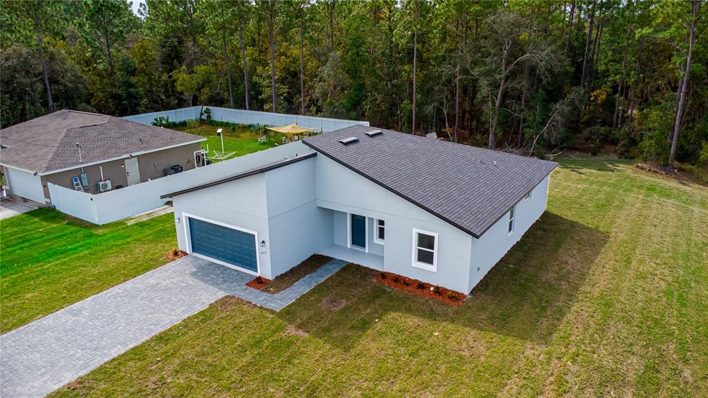 6418 Southwest 155th Place Ocala, FL 34473 - Photo 2 of 44