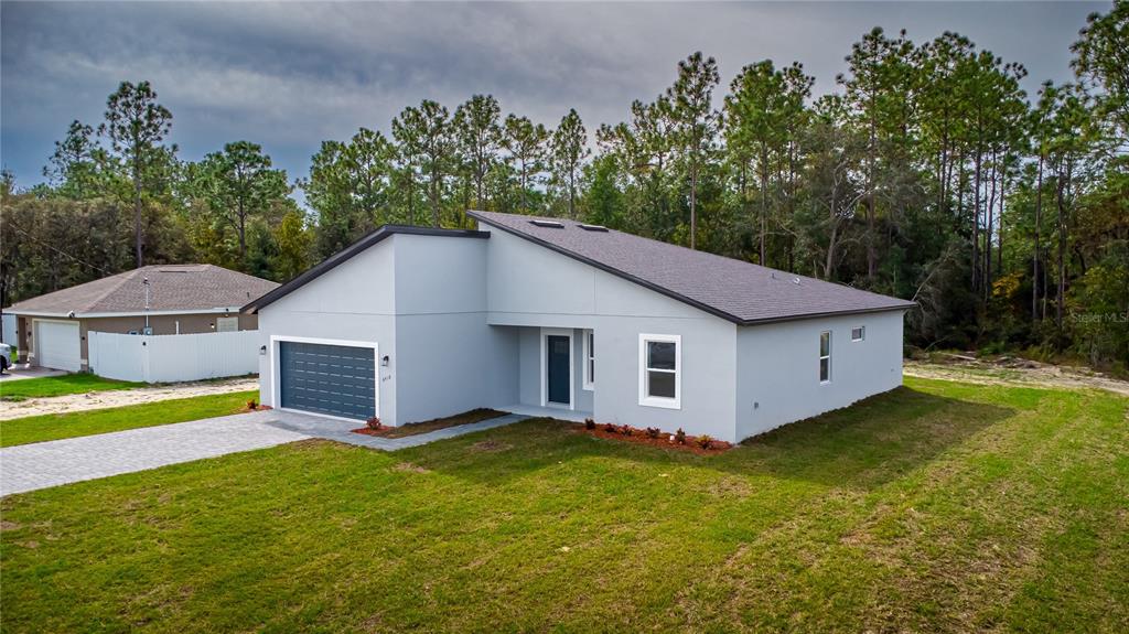 6418 Southwest 155th Place Ocala, FL 34473 - Photo 3 of 44