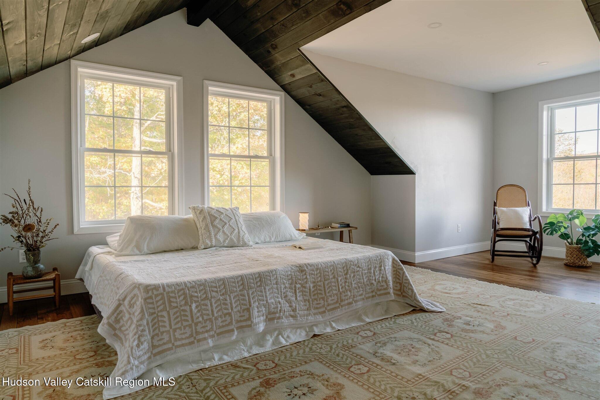 321 Mutton Hill Road Neversink, NY 12765 - Photo 14 of 25 a bedroom with a bed and window