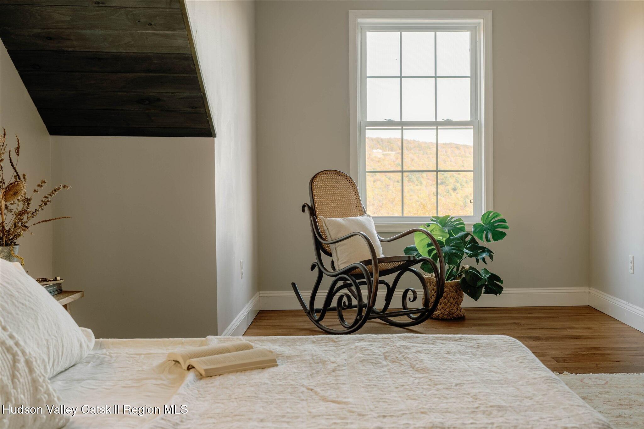 321 Mutton Hill Road Neversink, NY 12765 - Photo 15 of 25 a picture of a table and a potted plant