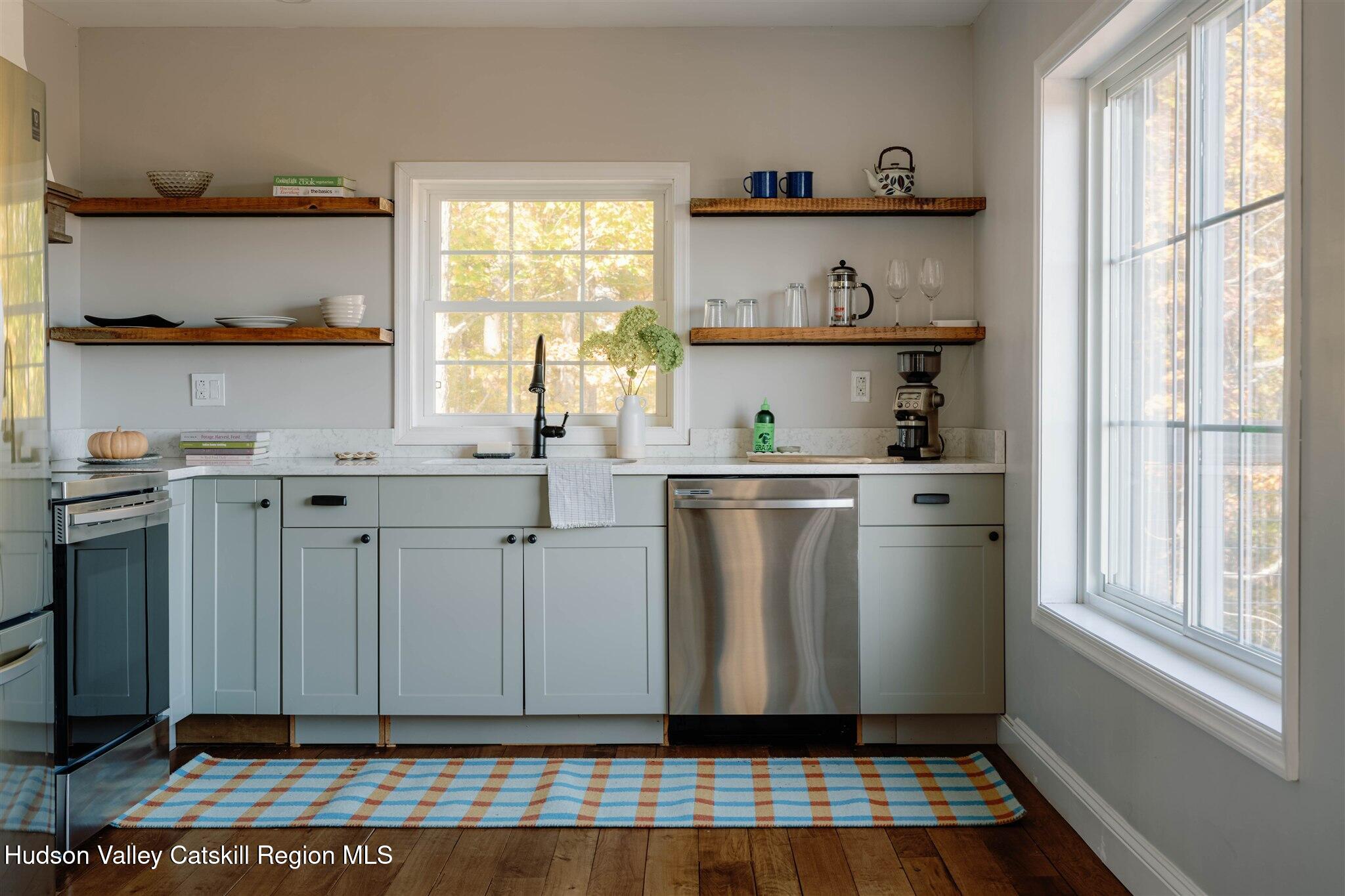 321 Mutton Hill Road Neversink, NY 12765 - Photo 10 of 25 a room with wooden floor and window