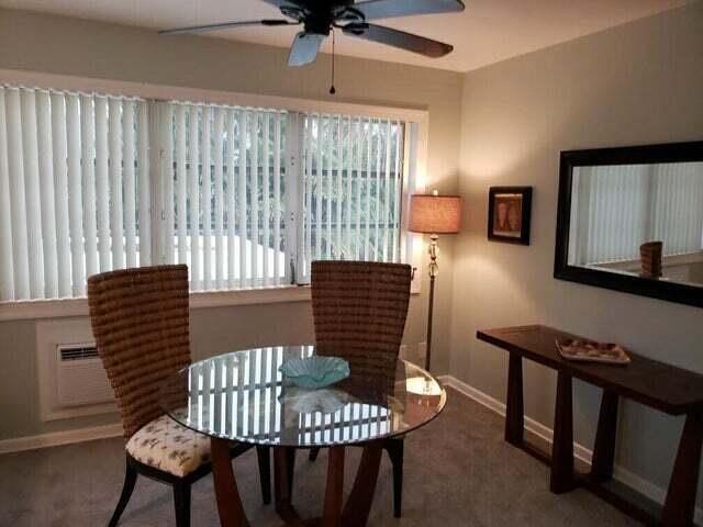 3125 Park Avenue, Unit 1 Singer Island, FL 33404 - Photo 5 of 9 a view of a livingroom with furniture