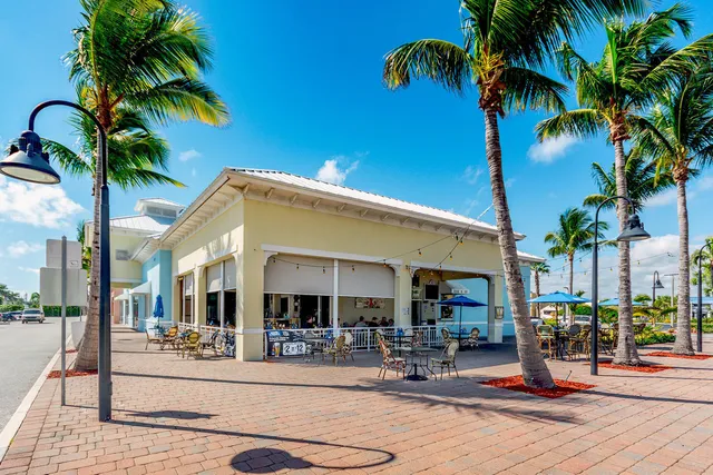 a view of a swimming pool with chairs