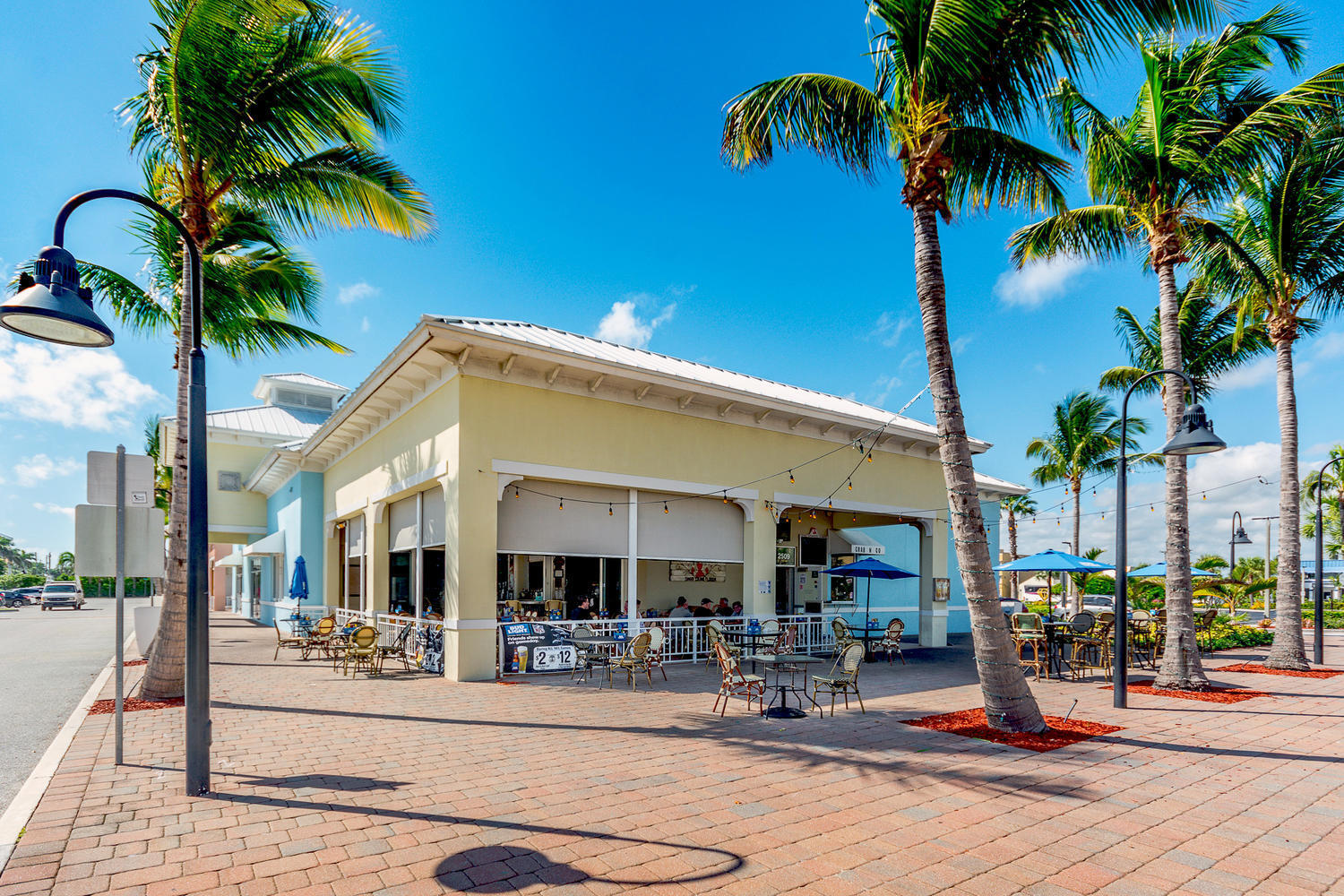 3125 Park Avenue, Unit 1 Singer Island, FL 33404 - Photo 7 of 9 a view of a swimming pool with chairs