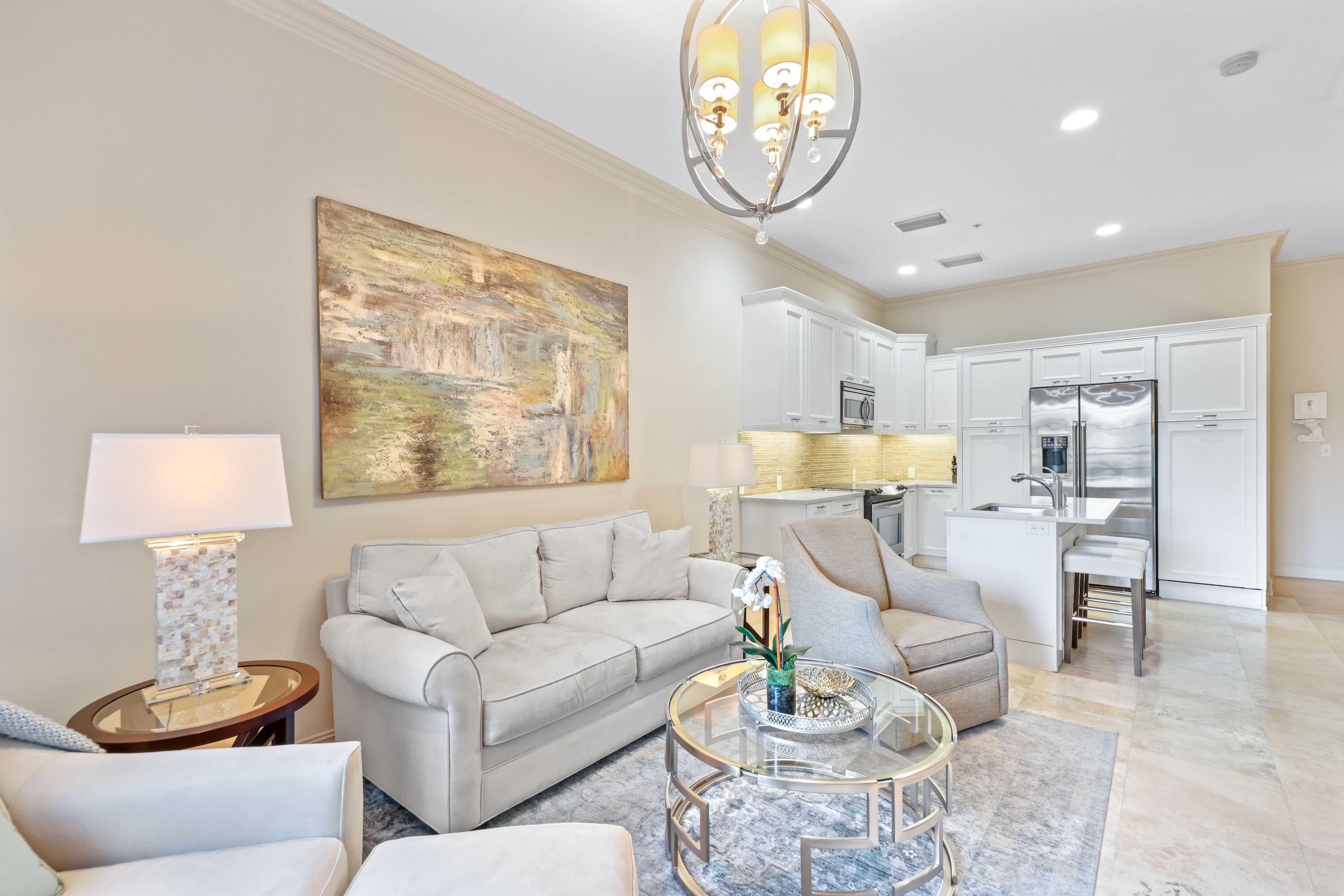 150 Northeast 6th Avenue, Unit K Delray Beach, FL 33483 - Photo 17 of 47 a living room with furniture and a wooden floor