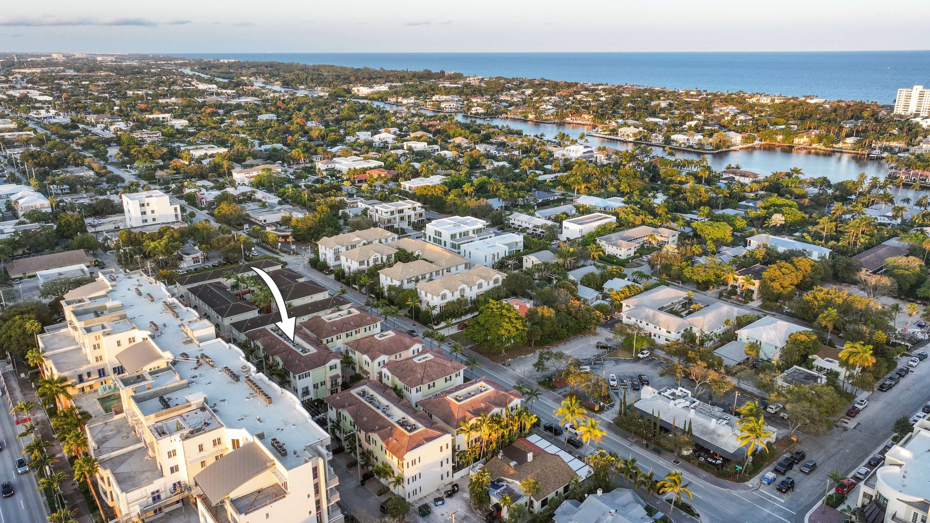 150 Northeast 6th Avenue, Unit K Delray Beach, FL 33483 - Photo 40 of 47 an aerial view of multiple house