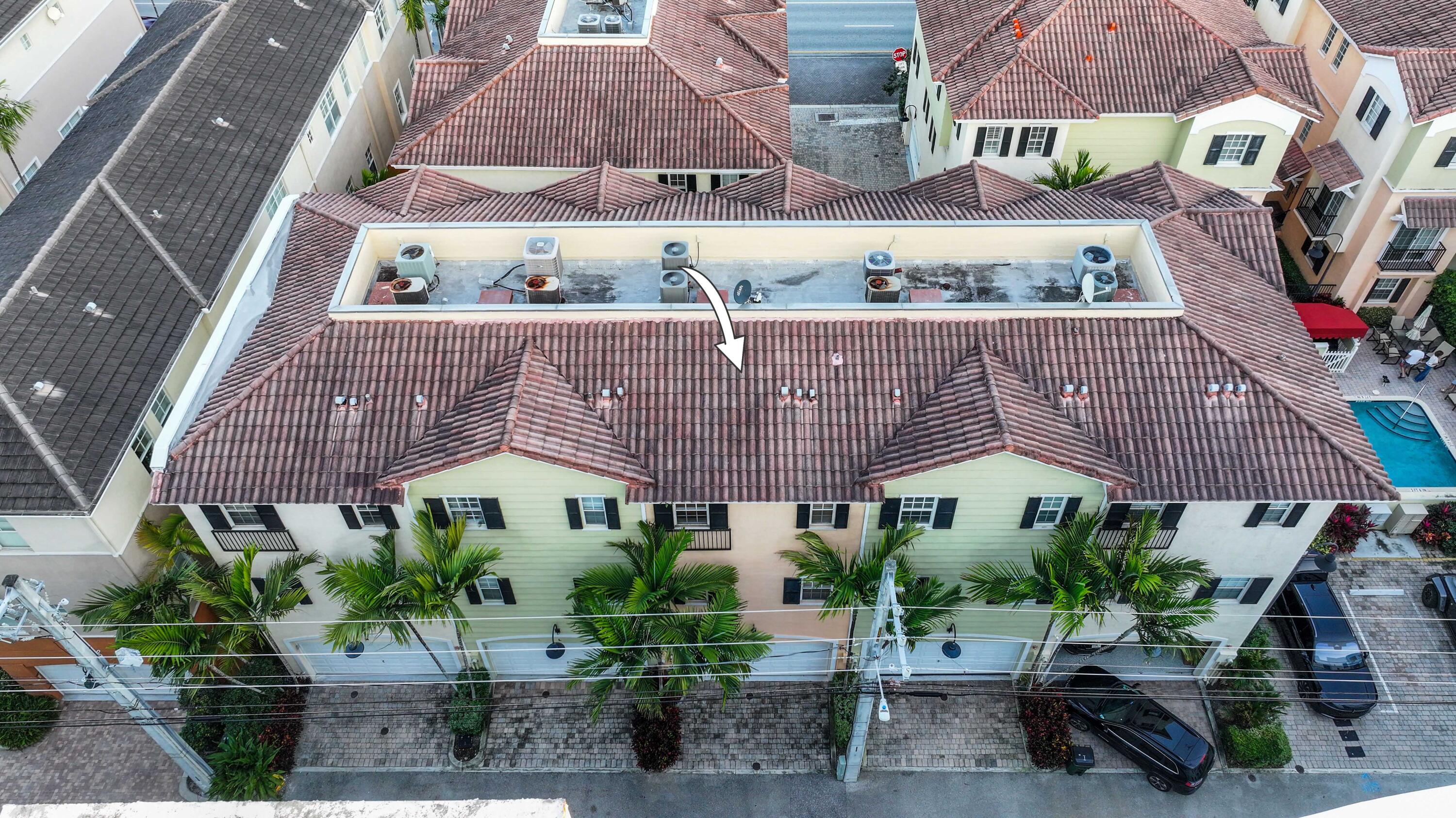 150 Northeast 6th Avenue, Unit K Delray Beach, FL 33483 - Photo 42 of 47 an aerial view of multiple houses