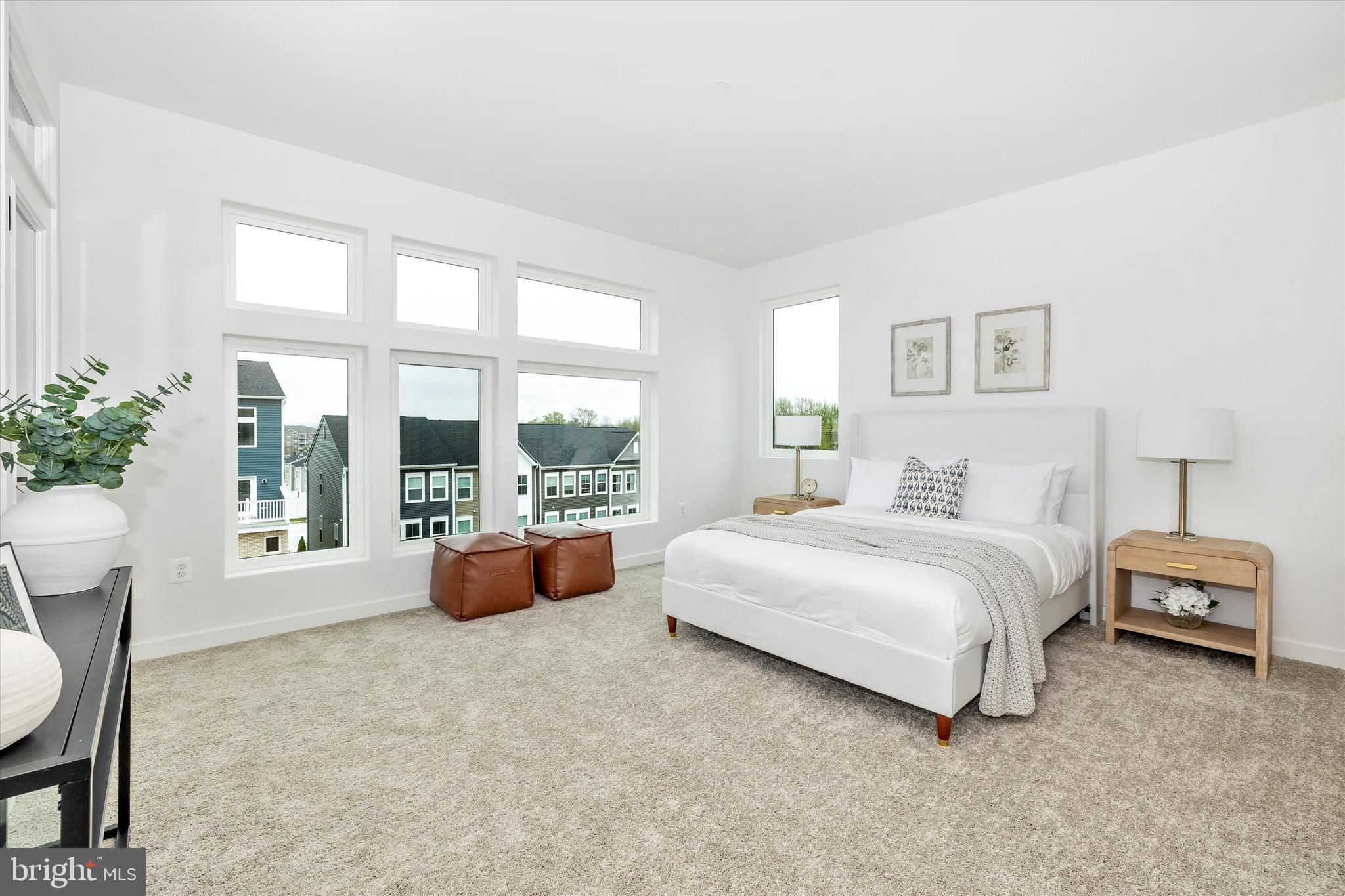 709 B Iron Frg Road, Unit 29 Frederick, MD 21702 - Photo 20 of 29 Primary bedroom with private covered terrace.