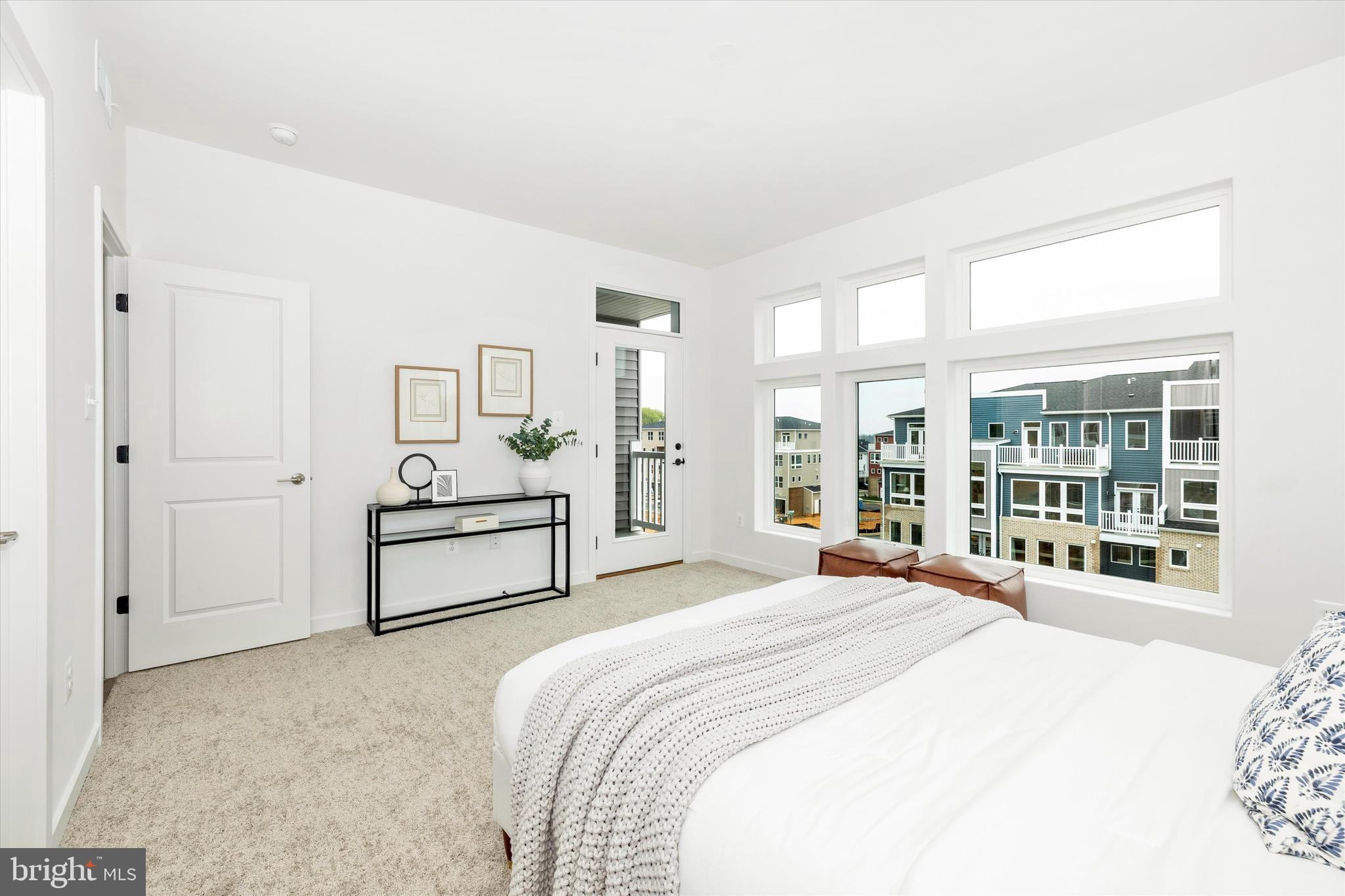 709 B Iron Frg Road, Unit 29 Frederick, MD 21702 - Photo 22 of 29 Primary bedroom with private covered terrace.