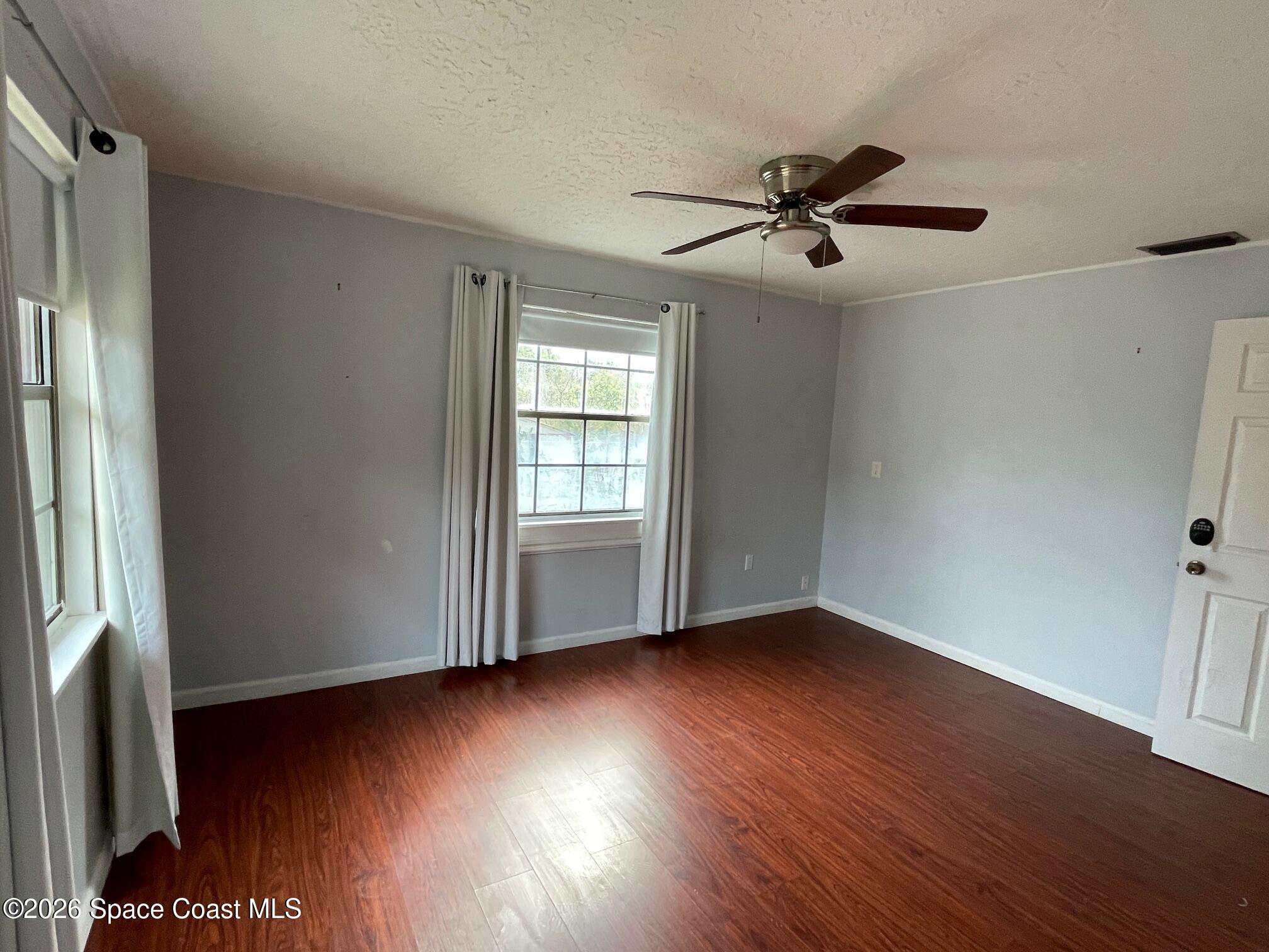 2235 Macedo Road Northeast Palm Bay, FL 32907 - Photo 17 of 23 Master bedroom